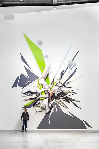 Mirko Reisser DAIM framför sin 3D graffiti mural painting