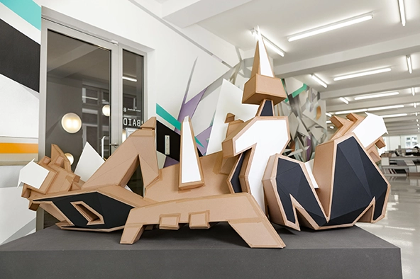 DAIM 3D graffiti sculpture i papp och kartong av Mirko Reisser