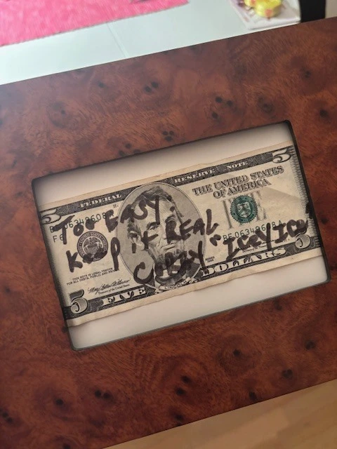 A 5 Dollar note with Icey Ice autograph