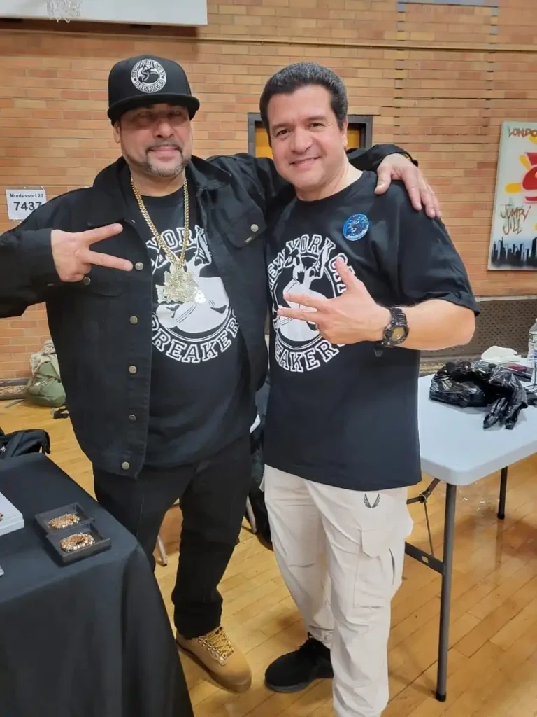 Kid Freeze from Dynamic Rockers poing together with Icey Ice with New York City Breakers t-shirts.